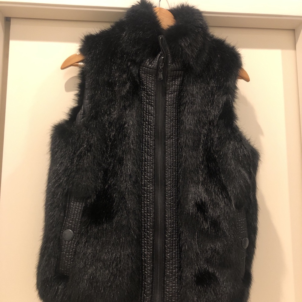 Two side MK vest.